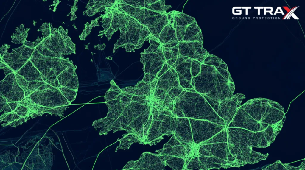 Map of UK and Ireland with dense glowing green network lines covering land. GT TRAX GROUND PROTECTION logo top right.